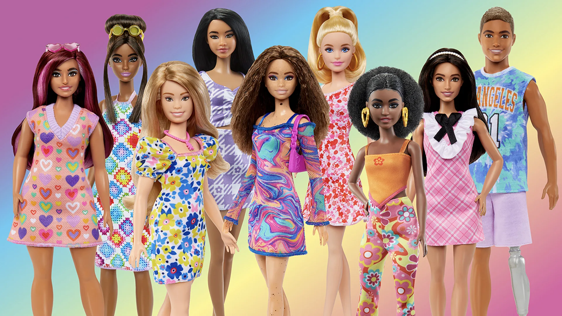 Group of fashion Barbies wearing different outfits