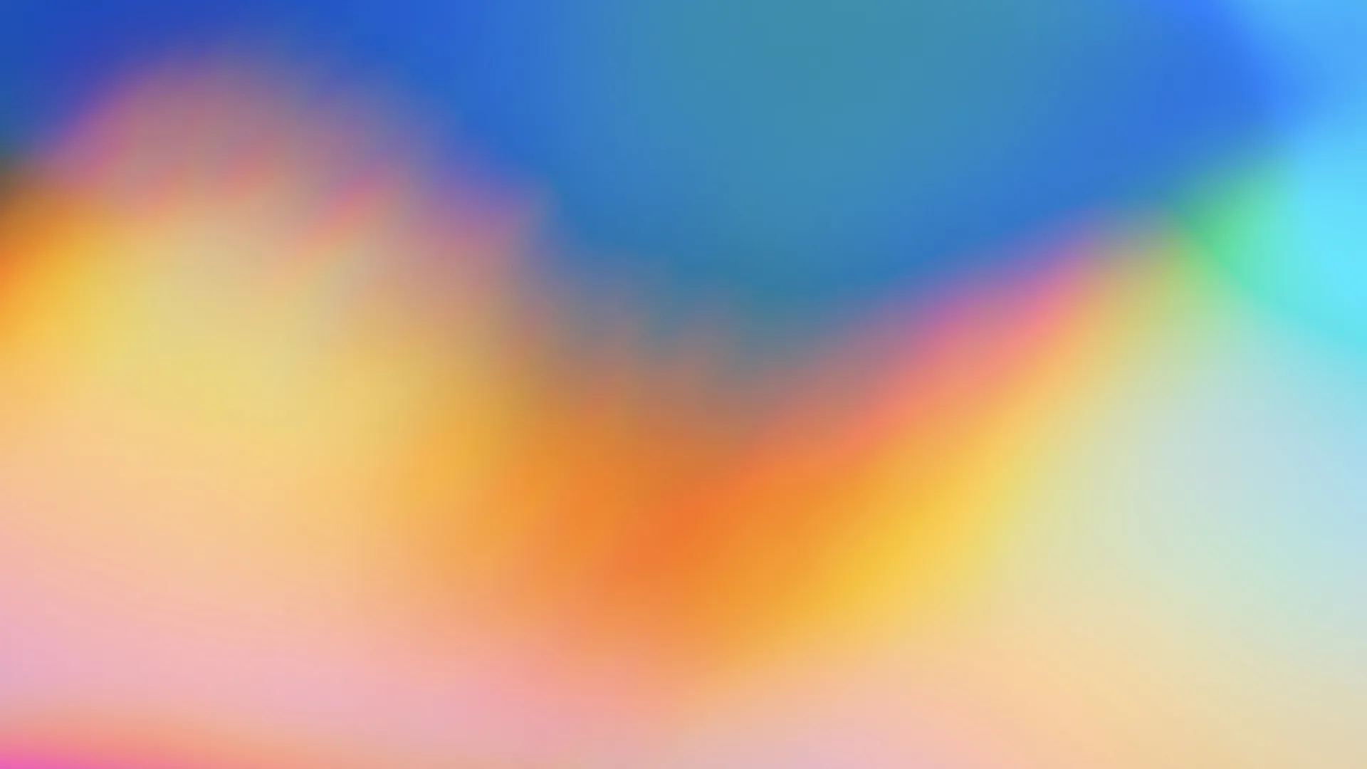A blurry image of a multi-coloured pattern