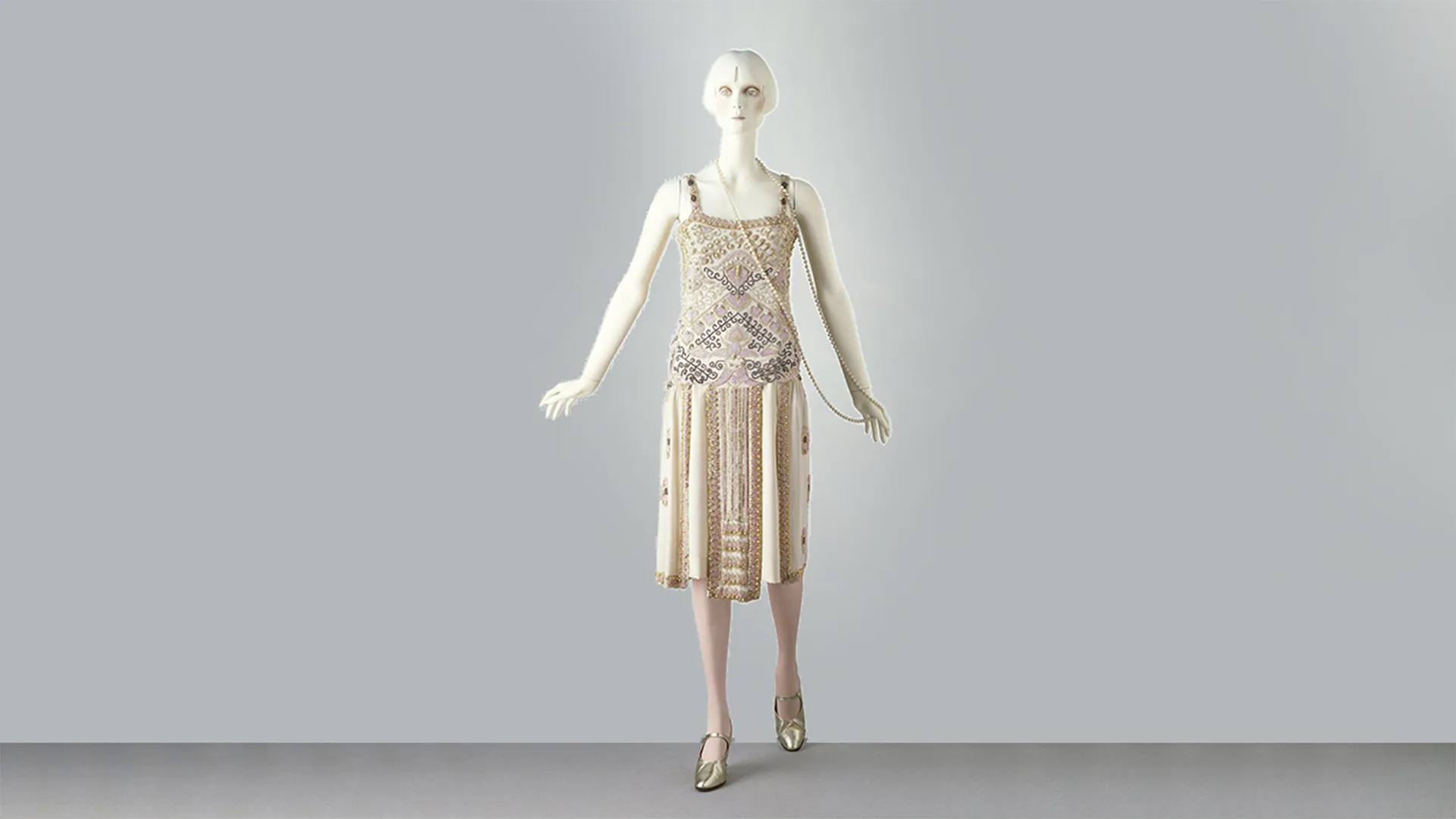 An embellished knee length dress