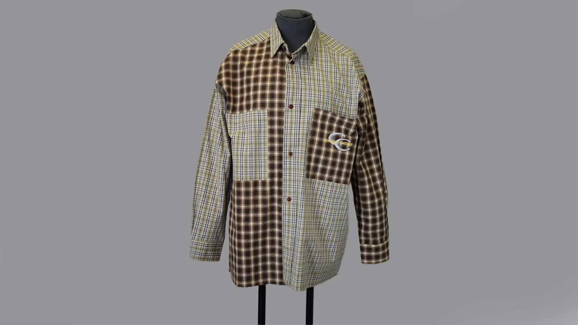 A patterned cotton shirt with large pockets and a logo on the right.