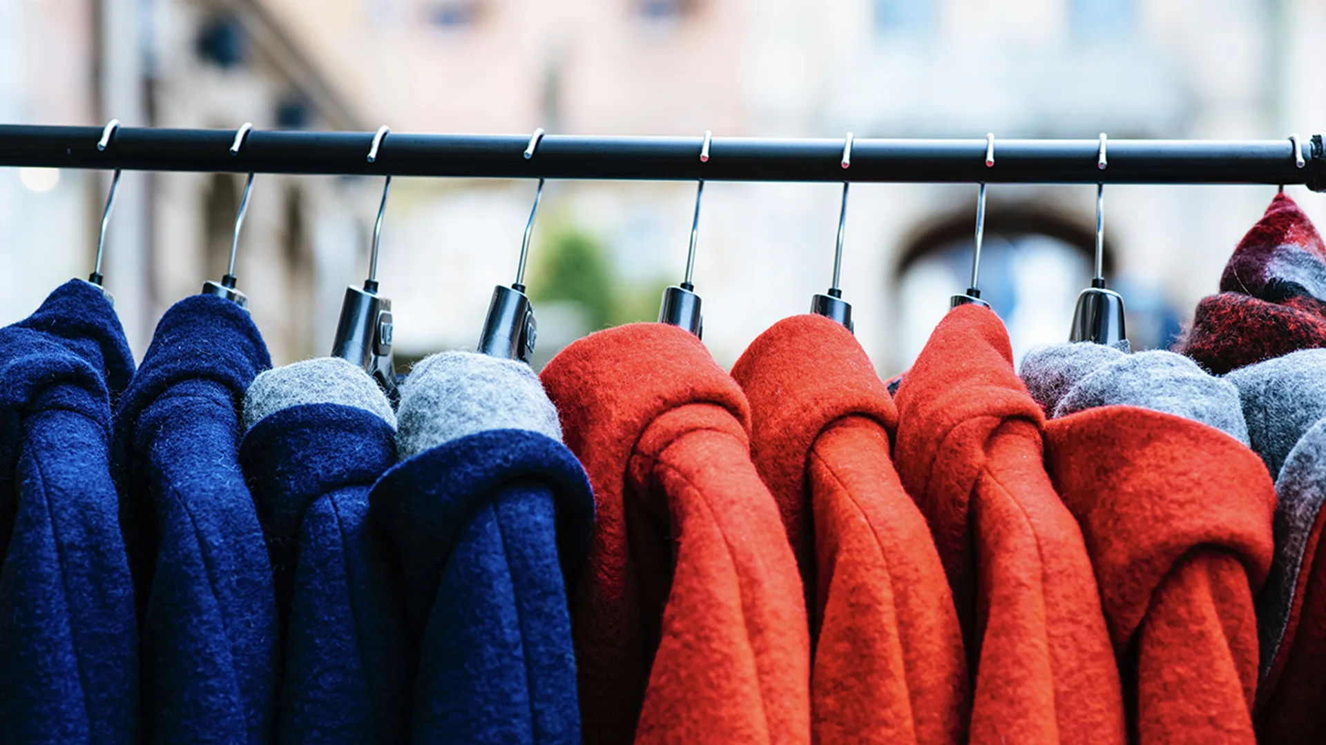 Winter jackets on a rail