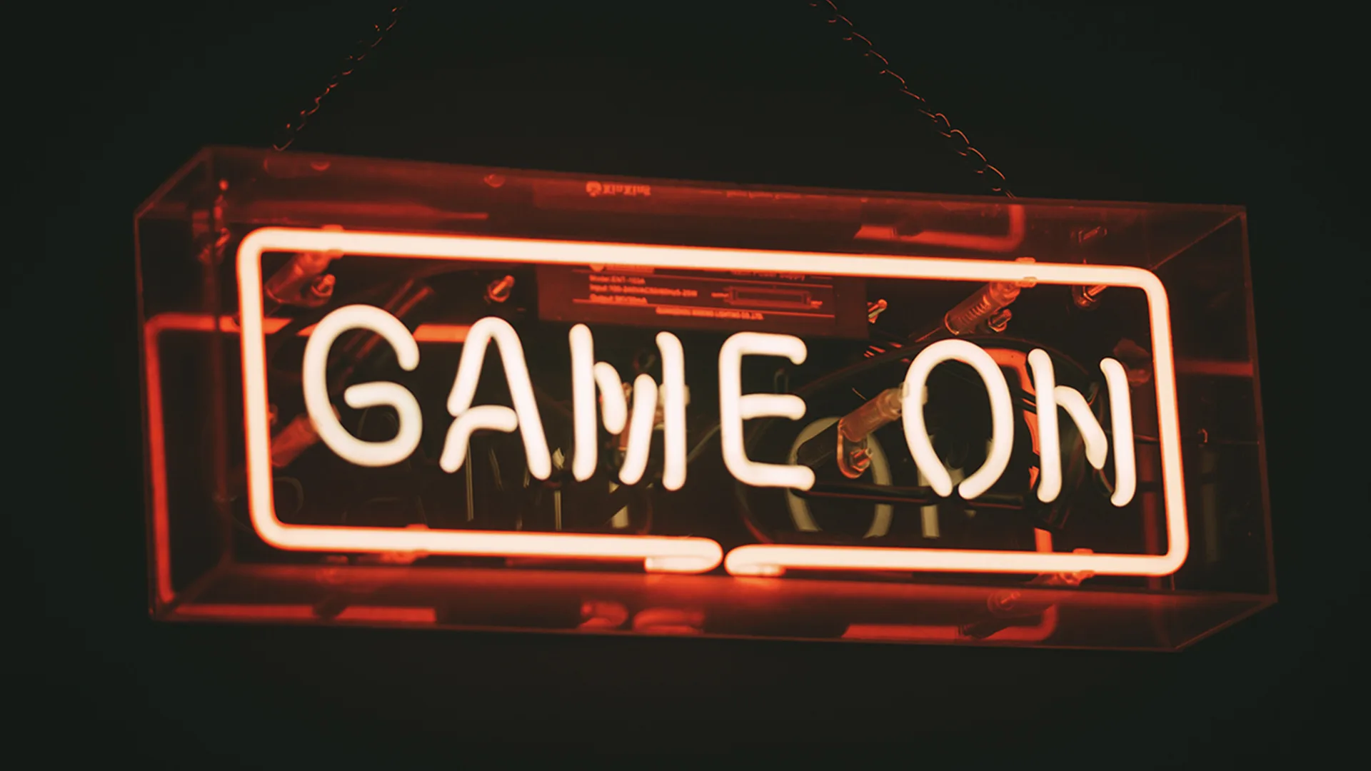 Neon lights in red saying 'Game On'