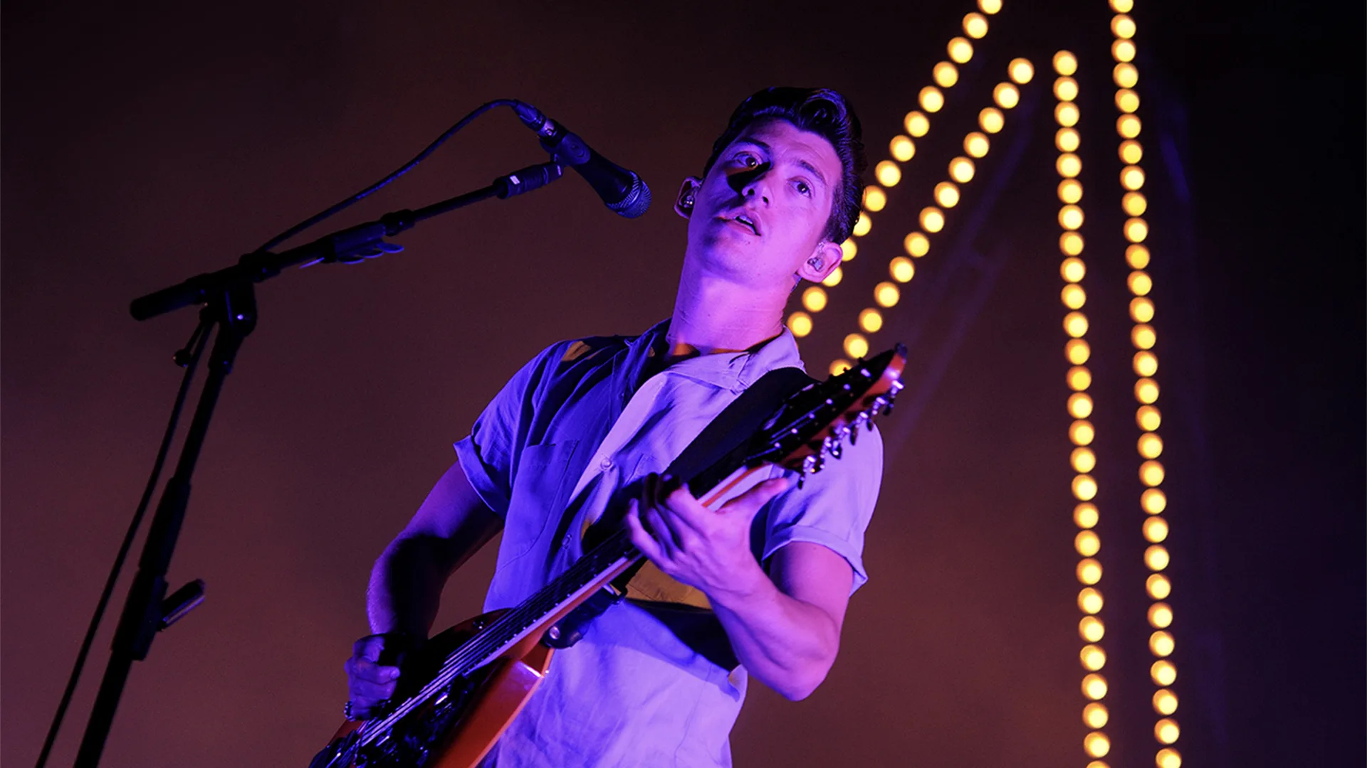Arctic Monkeys frontman performing a gig