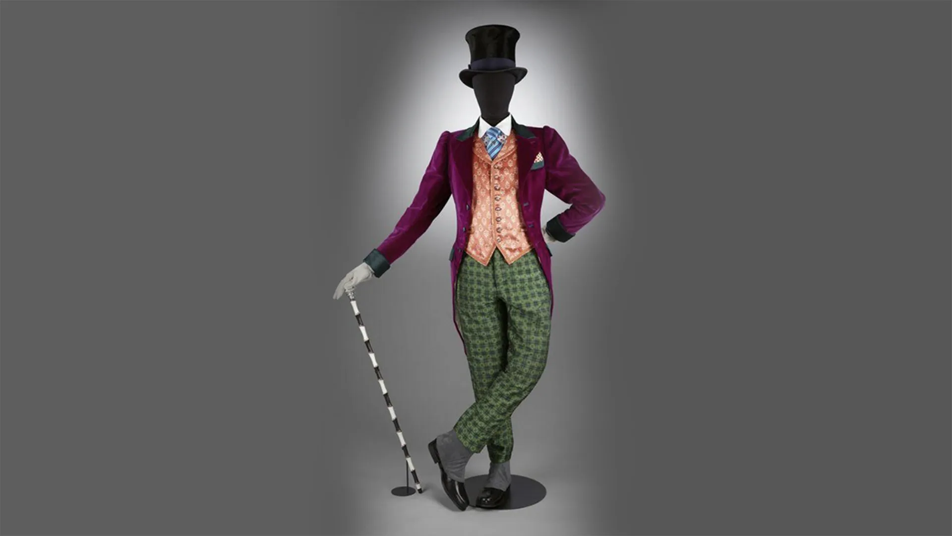 Willy Wonka costume, which shows a top hat, orange waistcoat, dark red jacket and trousers