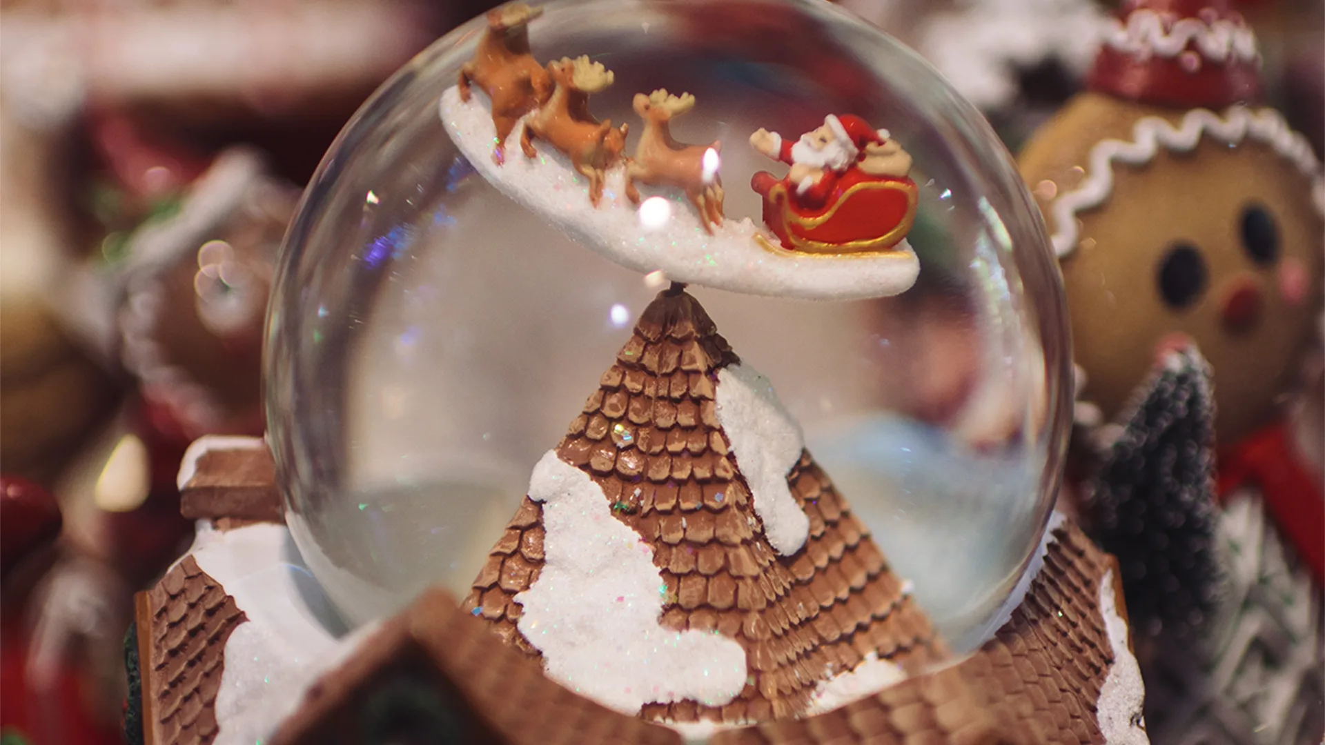 Christmas snowglobe with Santa and his reindeer in it