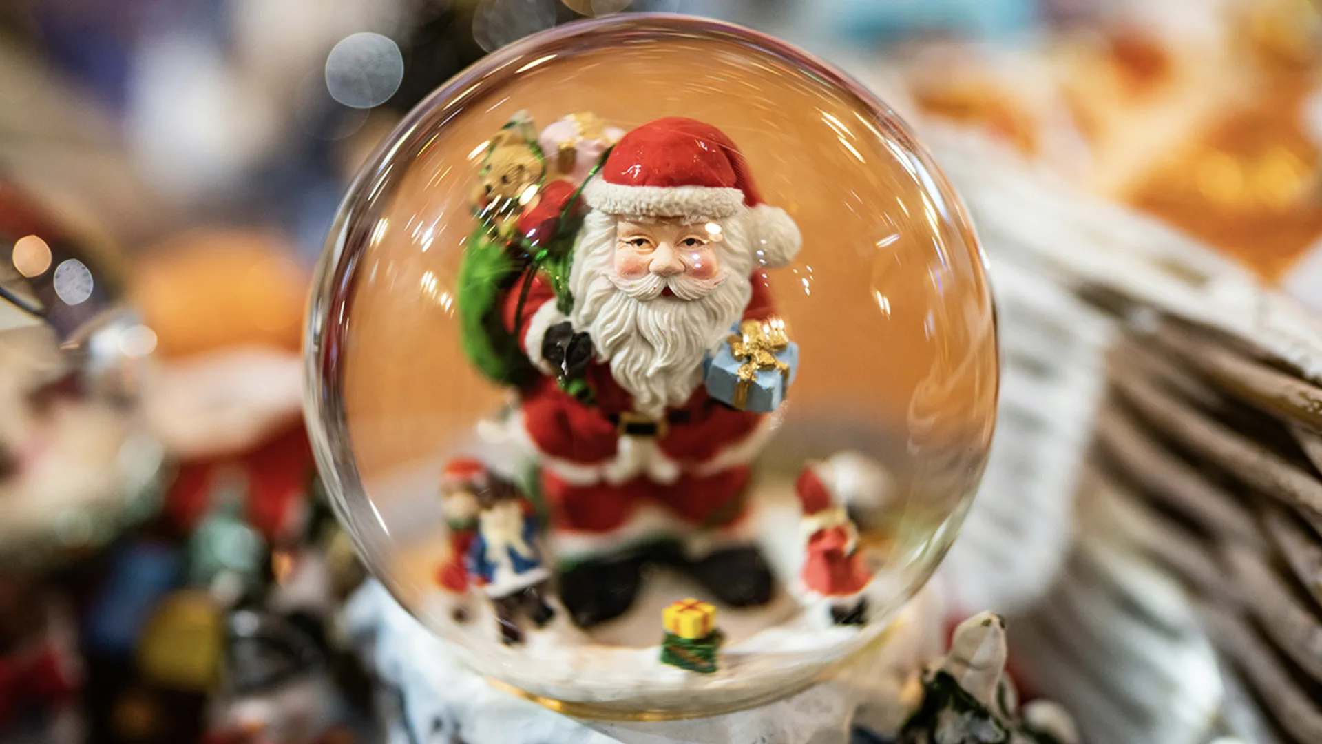Santa in a snow globe