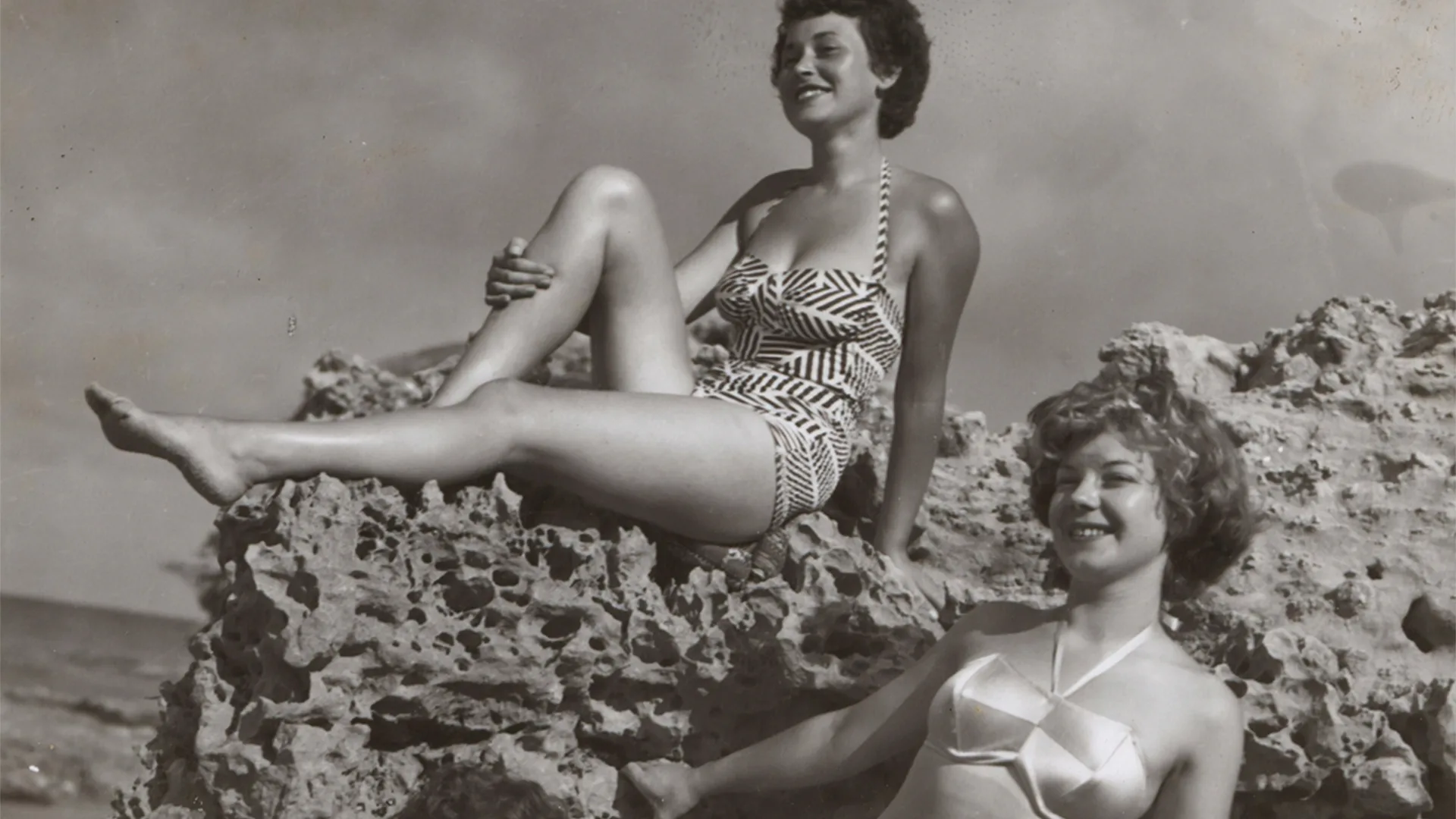 Black and white image of women wearing swimsuits