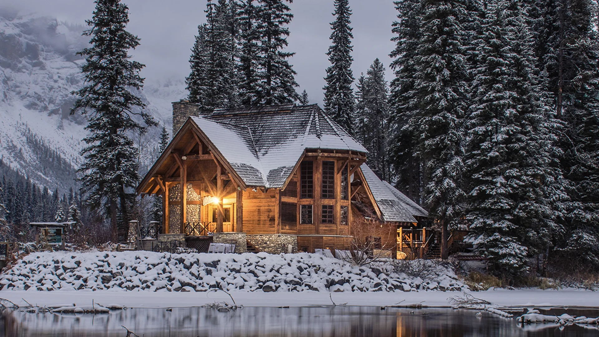 Log cabin in snowy setting