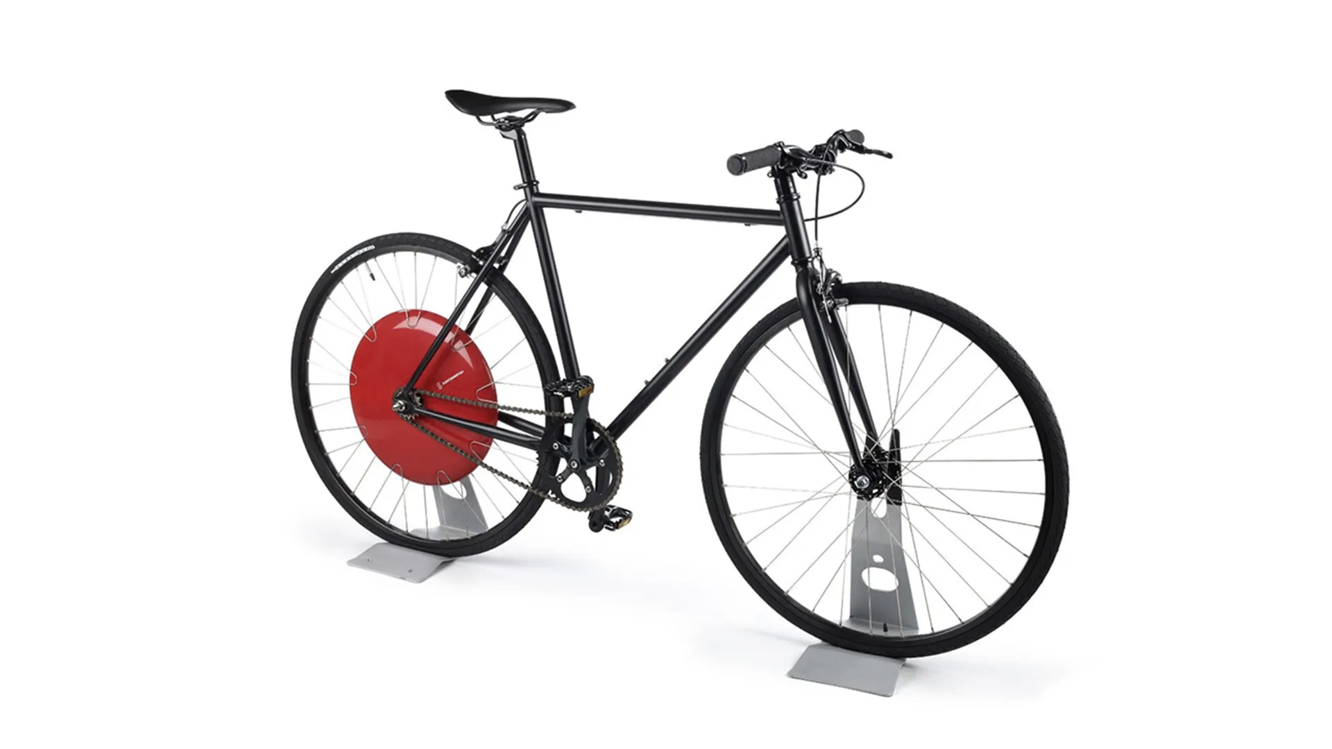 A black bike with a red back wheel