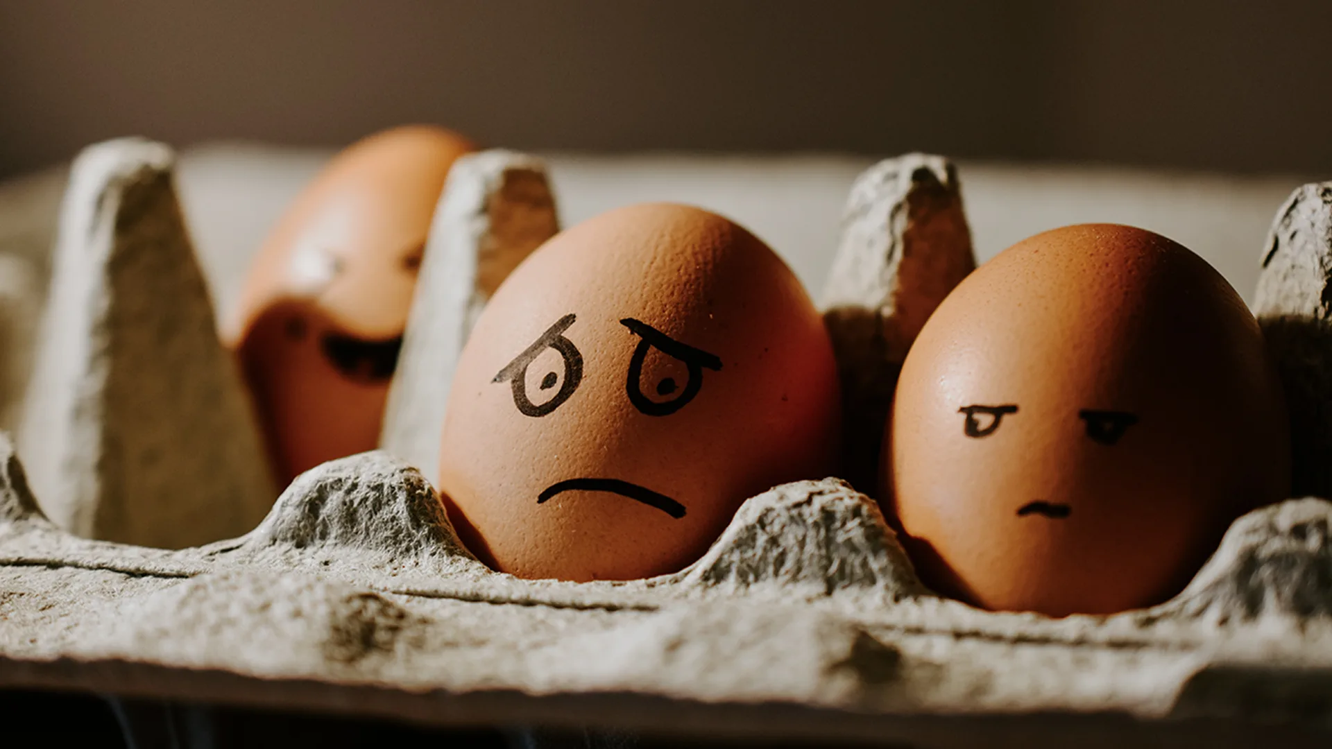 Eggs with sad faces drawn on