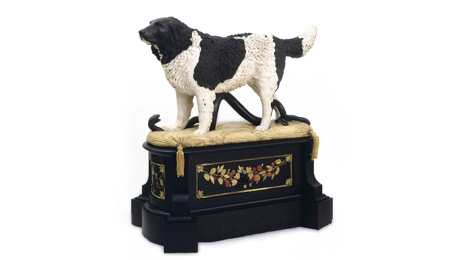 Sculpture of a newfoundland dog stood on dark wooden plinth