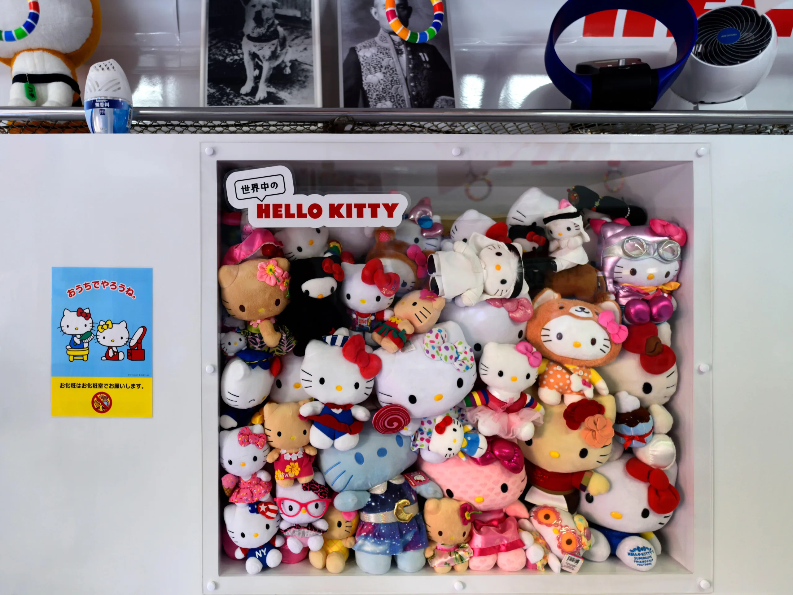 Stack of Hello Kitty cuddly toys