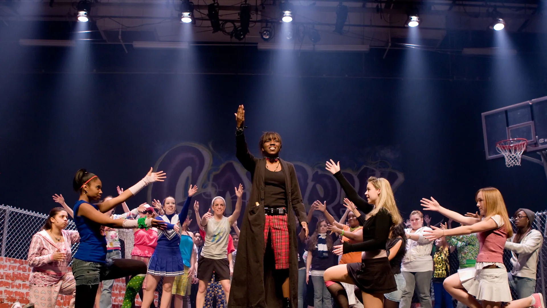 A photograph of a school production mid-performance on stage