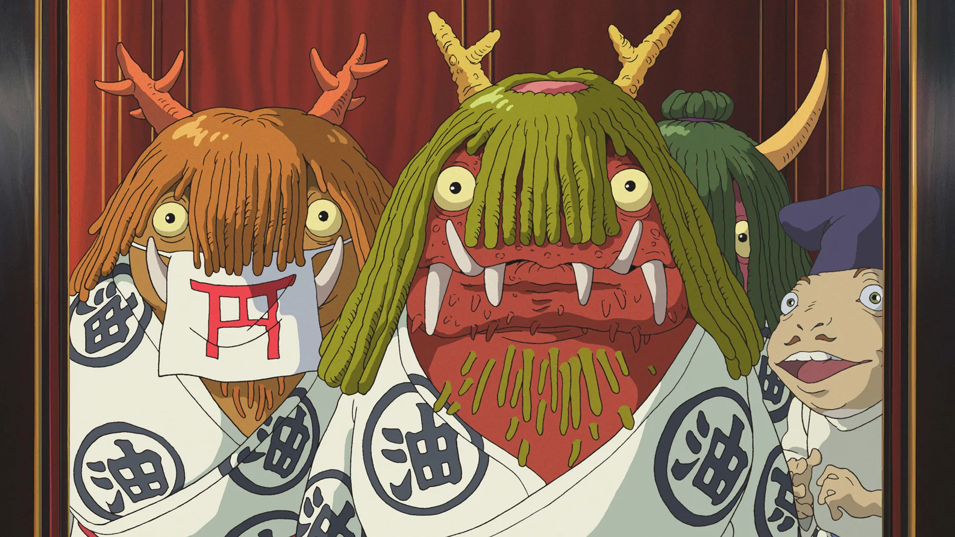 A still from the animated movie Spirited Away showing some monster characters looking surprised at something