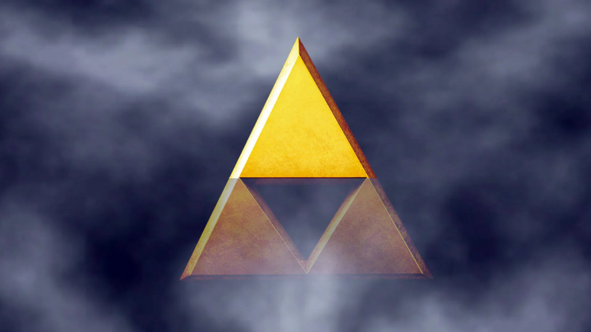 An image of the triforce from Legend of Zelda showing a golden triangle with a triangular hole in the middle. It is surrounded by a smokey grey background.