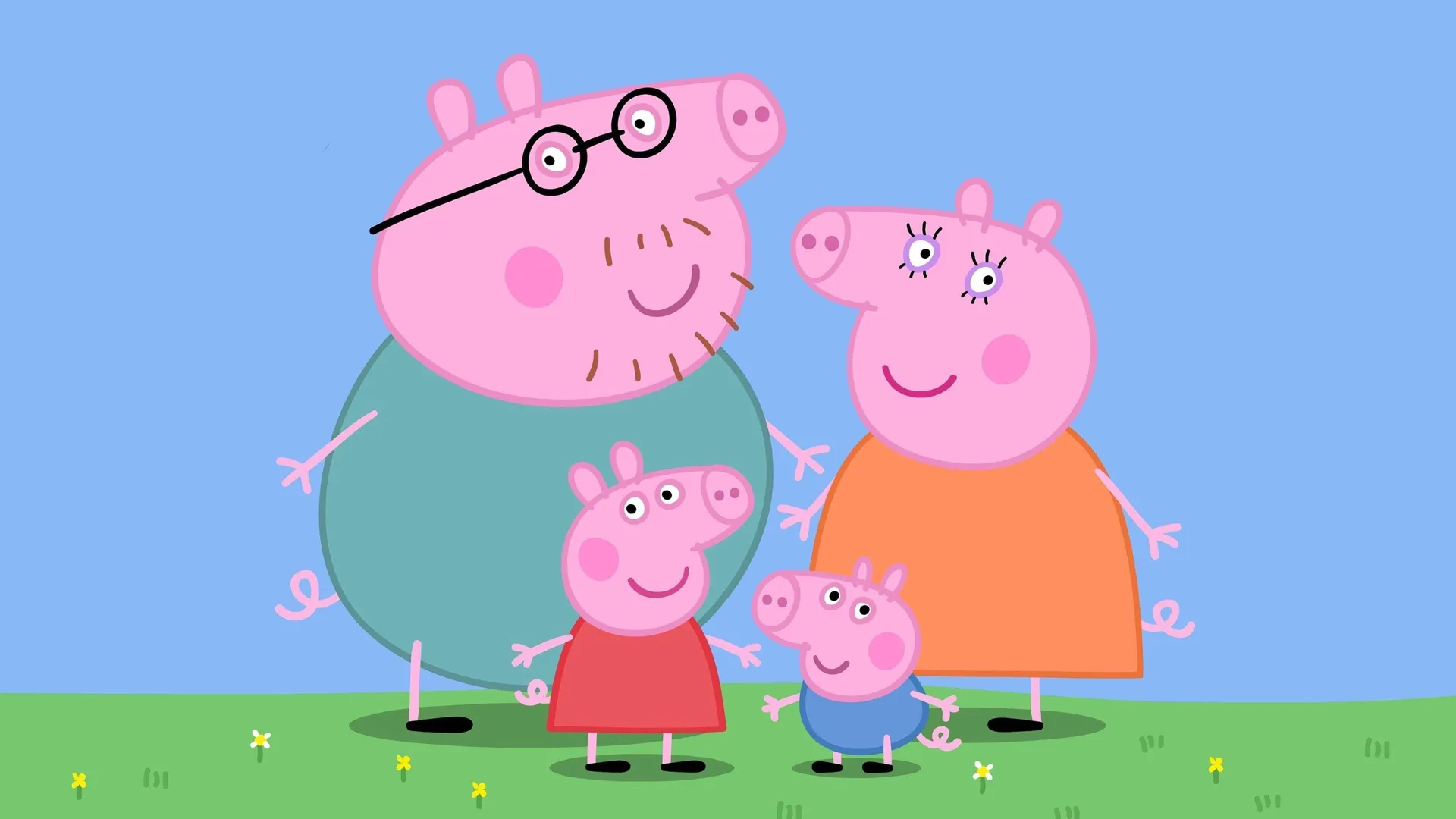 A still from Peppa Pig showing Daddy Pig, Mummy Pig, Peppa Pig and George Pig stood together smiling at the viewer on grass with a blue sky behind them.