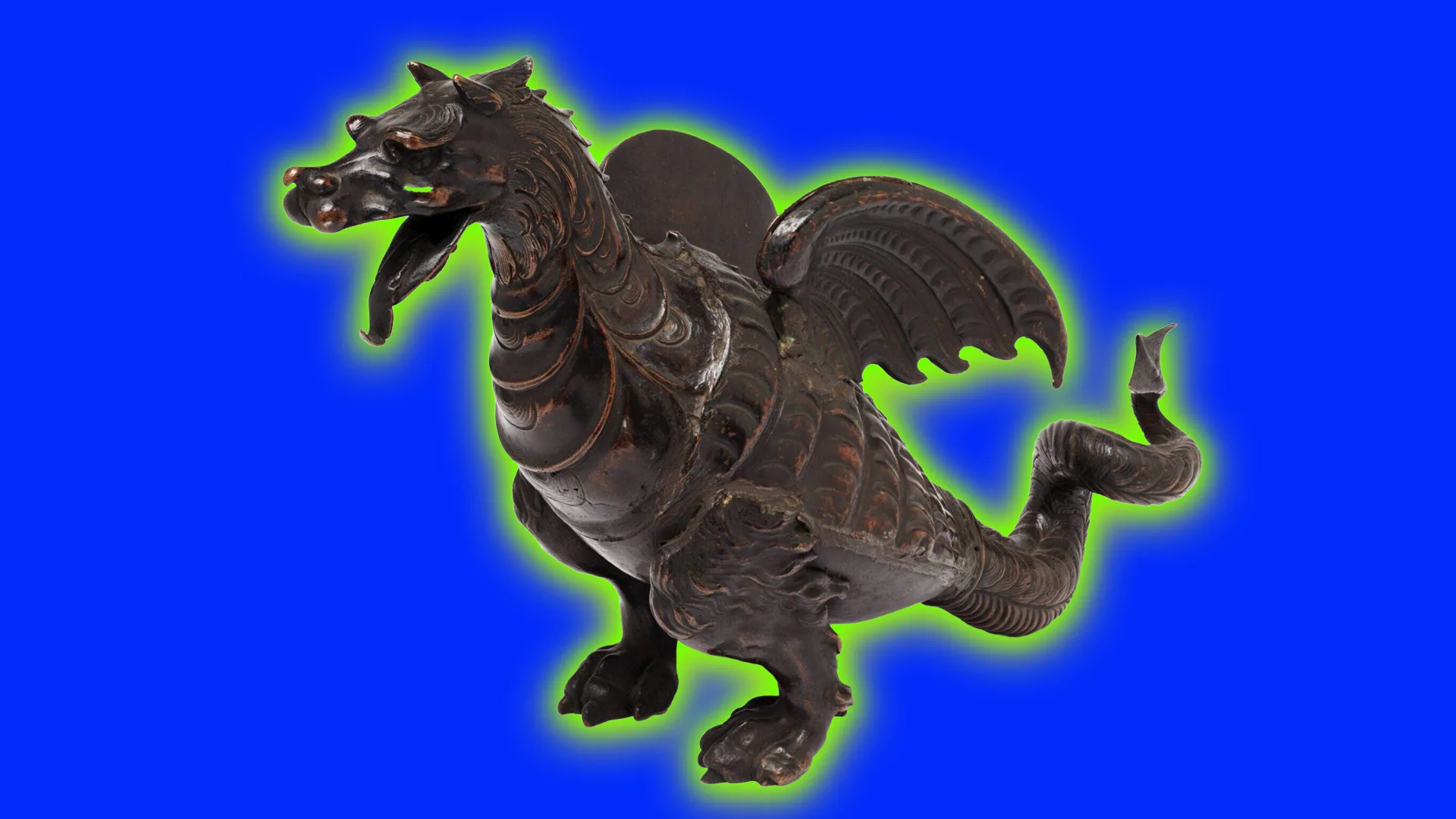 An image of a bronze dragon sculpture with its mouth open stood in an upright position set against a cobalt blue background with a green halo.