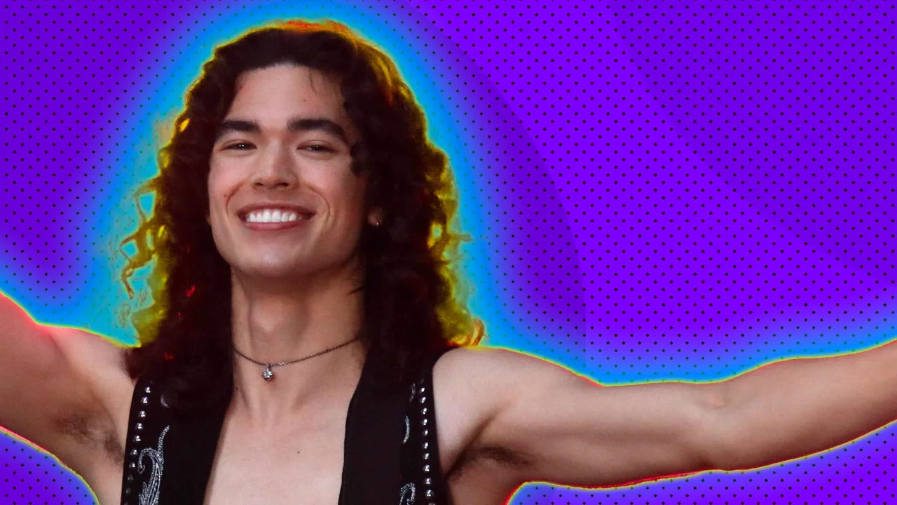 A photo of Conan Gray arms stretched out smiling with a black waistcoat, set against a purple dotted background with a blue and yellow halo.