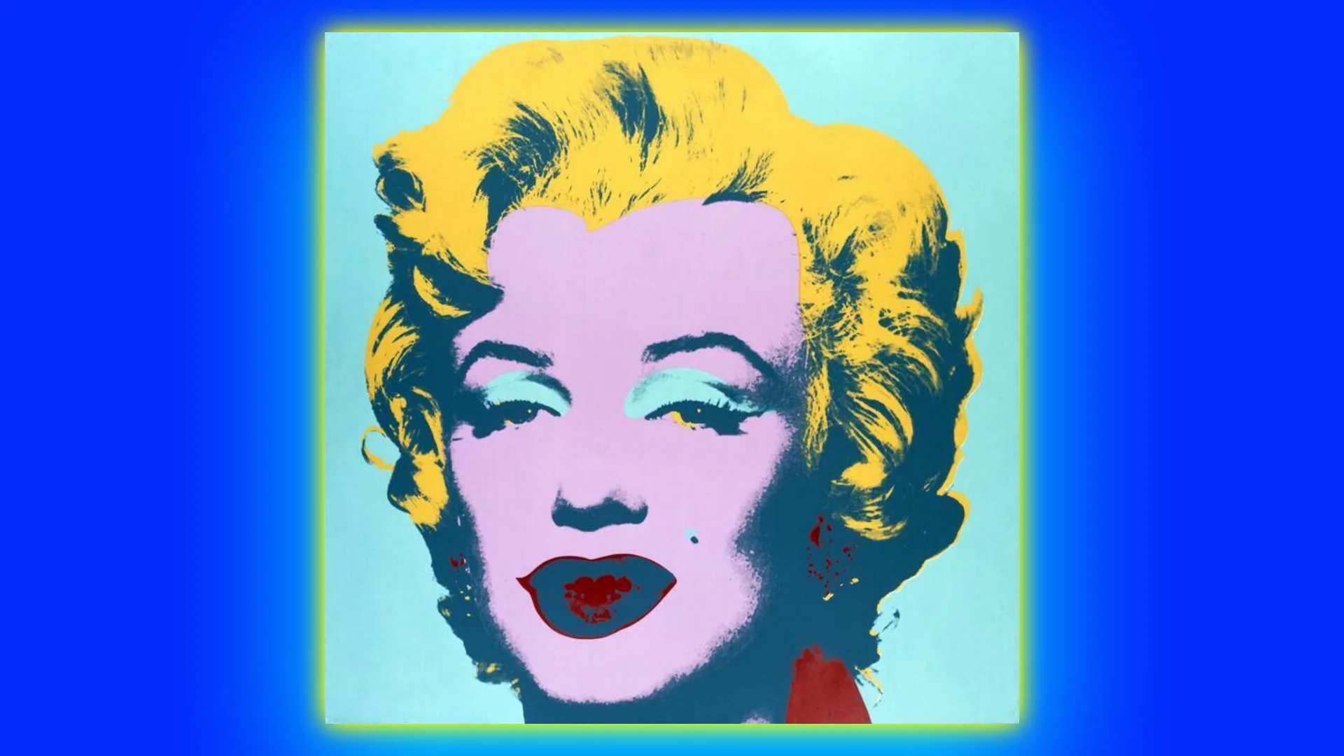 An image of Andy Warhol's pop art print of Marilyn Monroe showing her with bright pink skin, yellow hair and red lips, blue eyes set against a light blue background bordered with cobalt blue and a green halo.