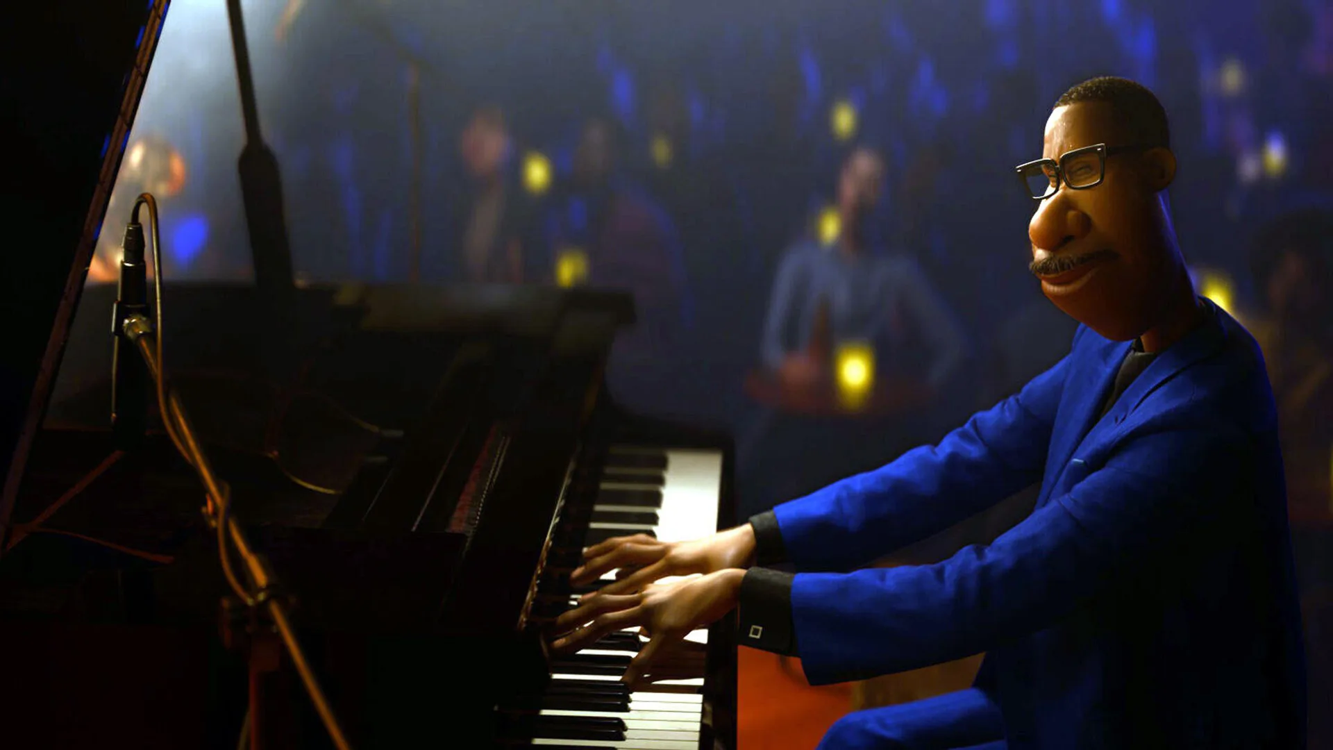 A still from Disney's Soul showing Joe Gardner playing at the piano smiling to a candlelit audience.