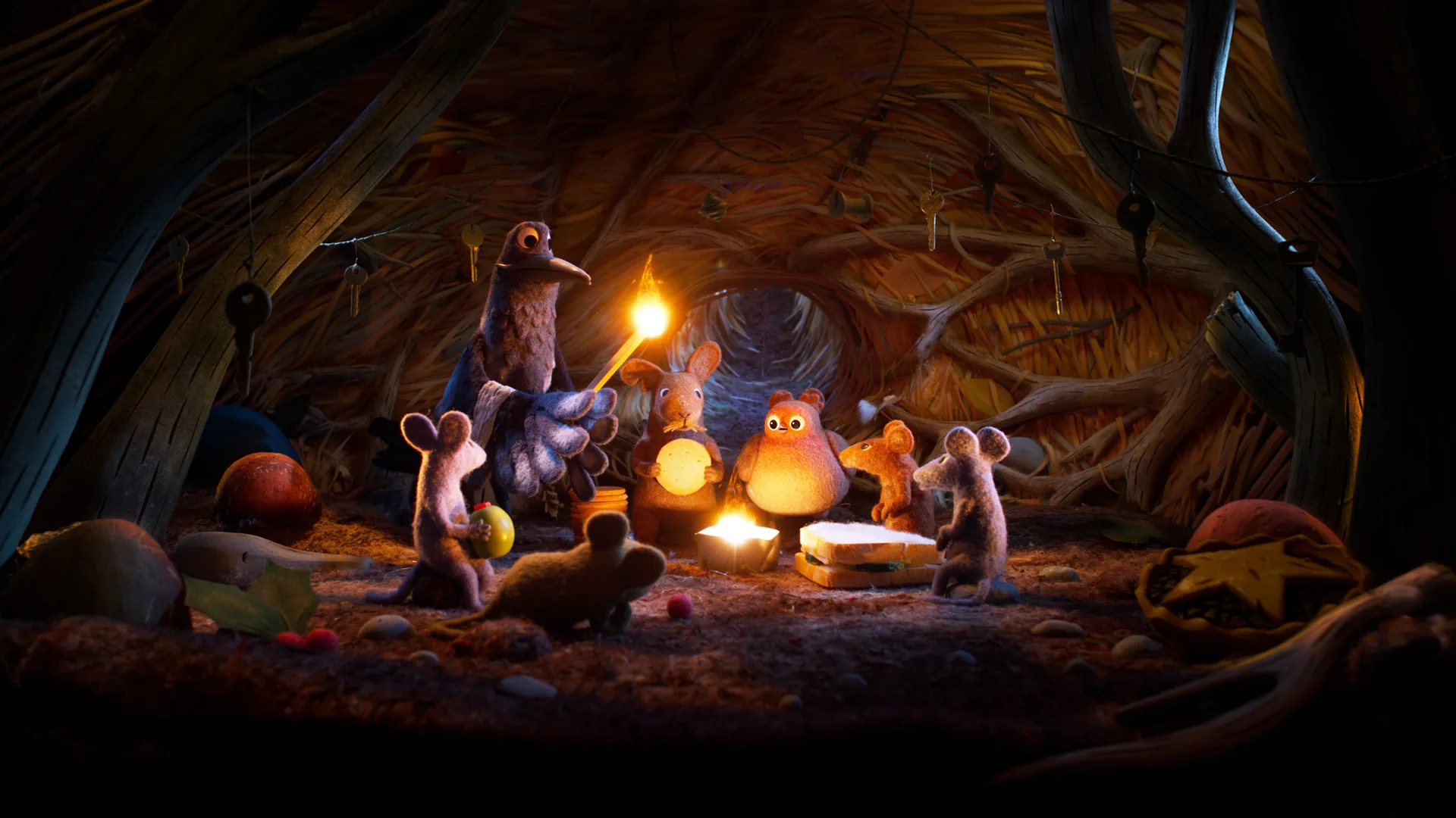 A still from Robin Robin showing the group gathering around a flame with a sandwich and food to share.