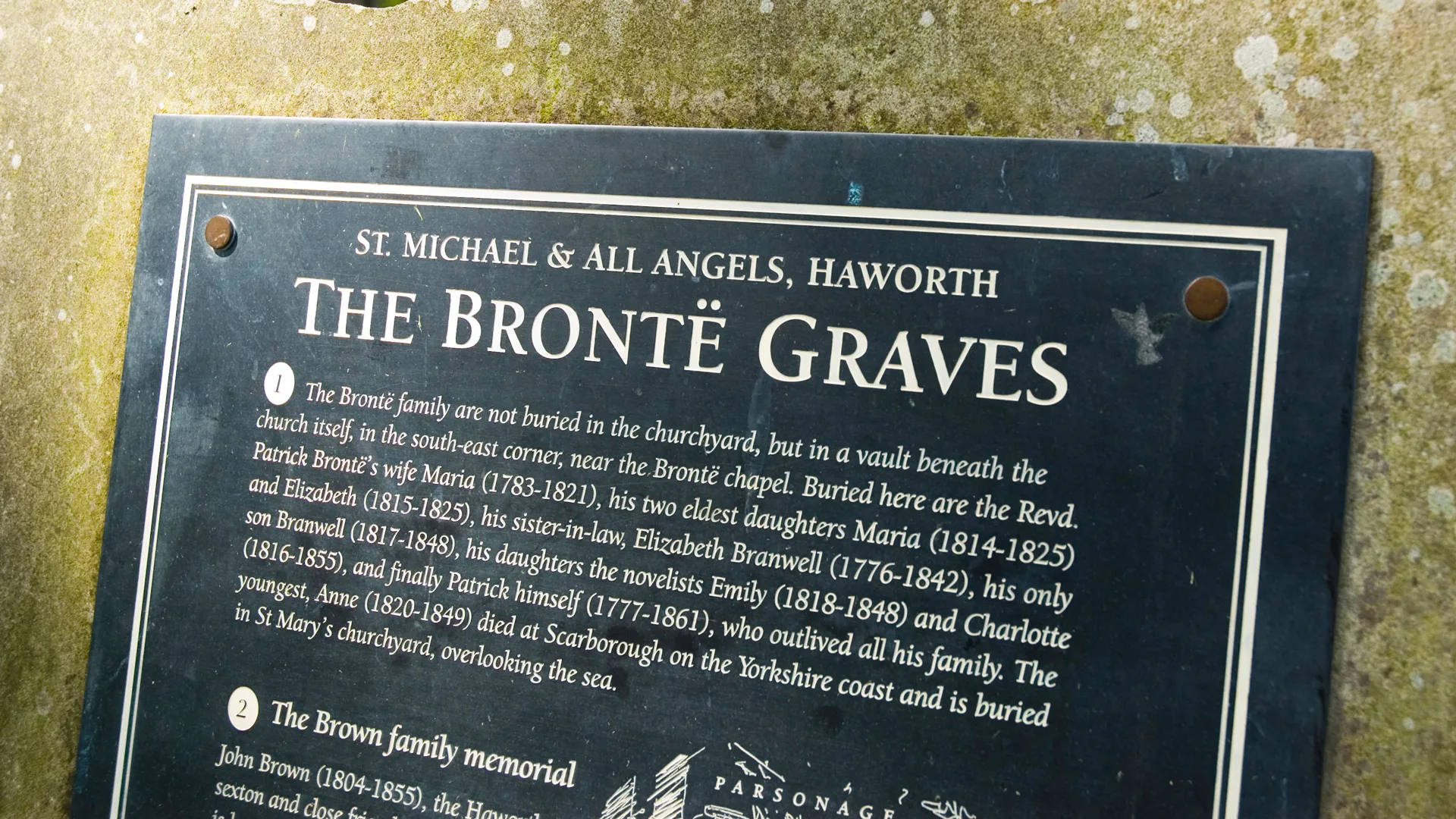 A photo of a plaque commemorating the Bront&euml; sister's graves at Hawworth, Yorkshire.