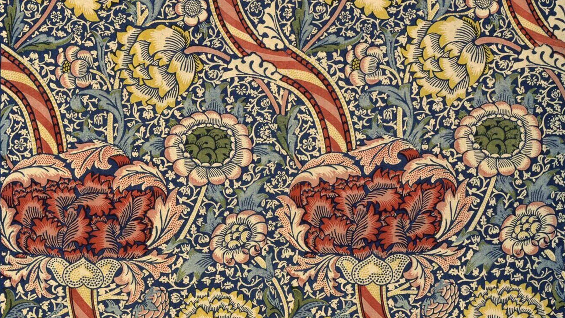 A pattern by William Morris called "Wandle" showing red chrysanthemums with green and blue leaves and pink flowers.