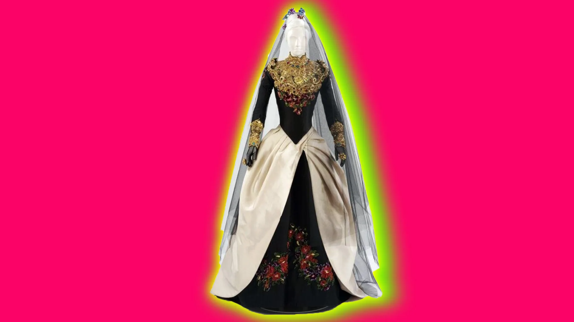 A wedding dress with a black and gold bodice, a veil and black velvet skirt with cream panniers overlaid. Set against a pink background with a green halo.