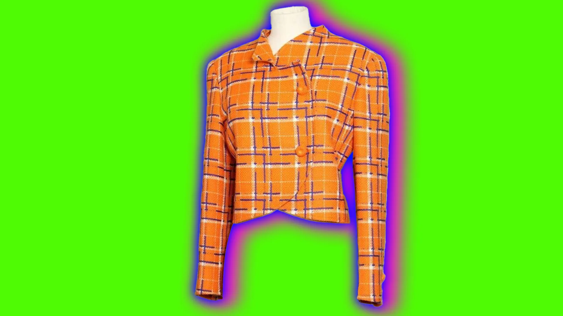 An orange patterned woolen jacket with long sleeves on a white mannequin set against a bright green background with a pink halo.