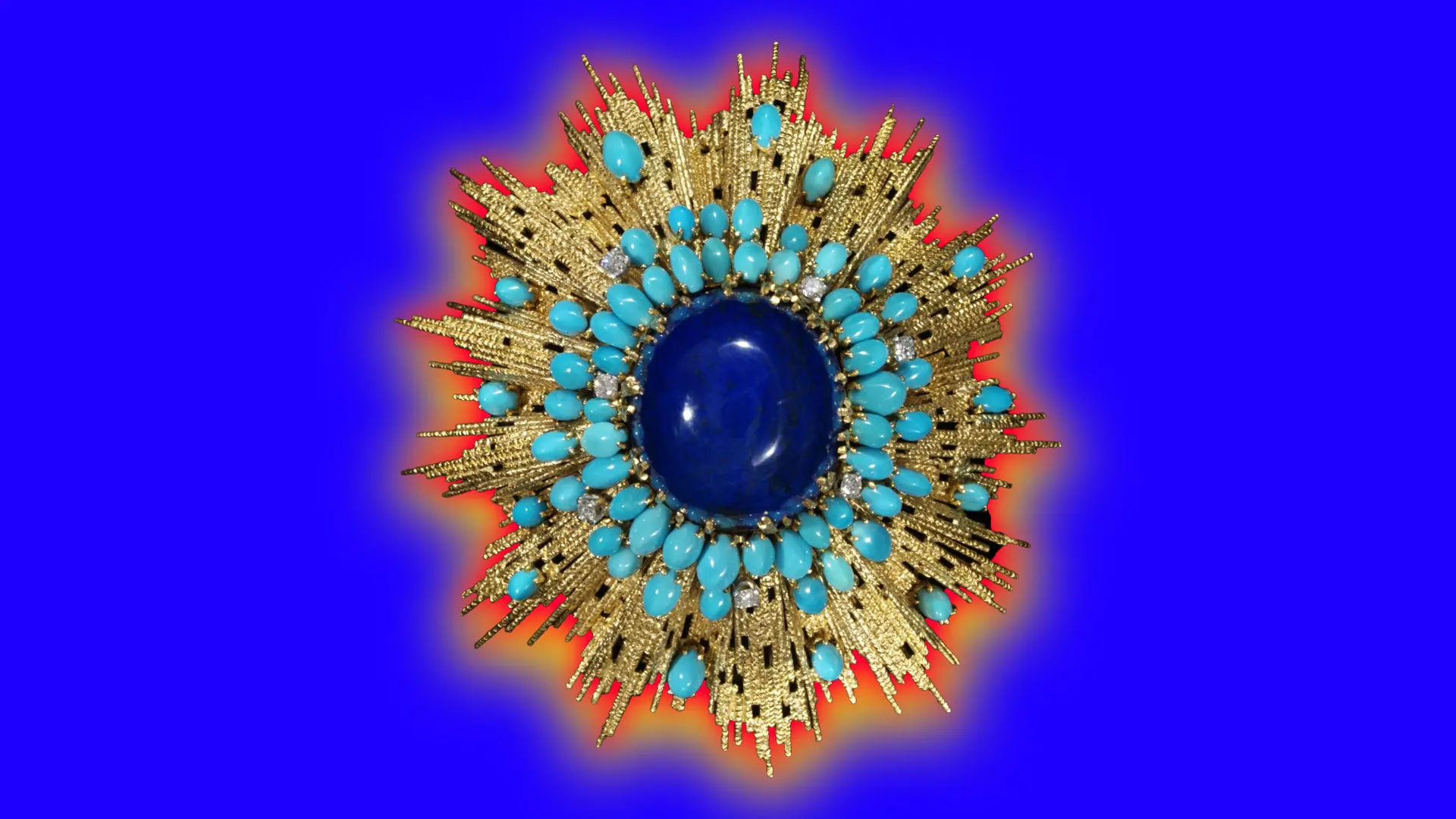 A photo of a retro brooch with asymmetric rays of textured gold wirework which radiate around the central cabochon stone of lapis lazuli set against a blue background with orange and yellow halo.