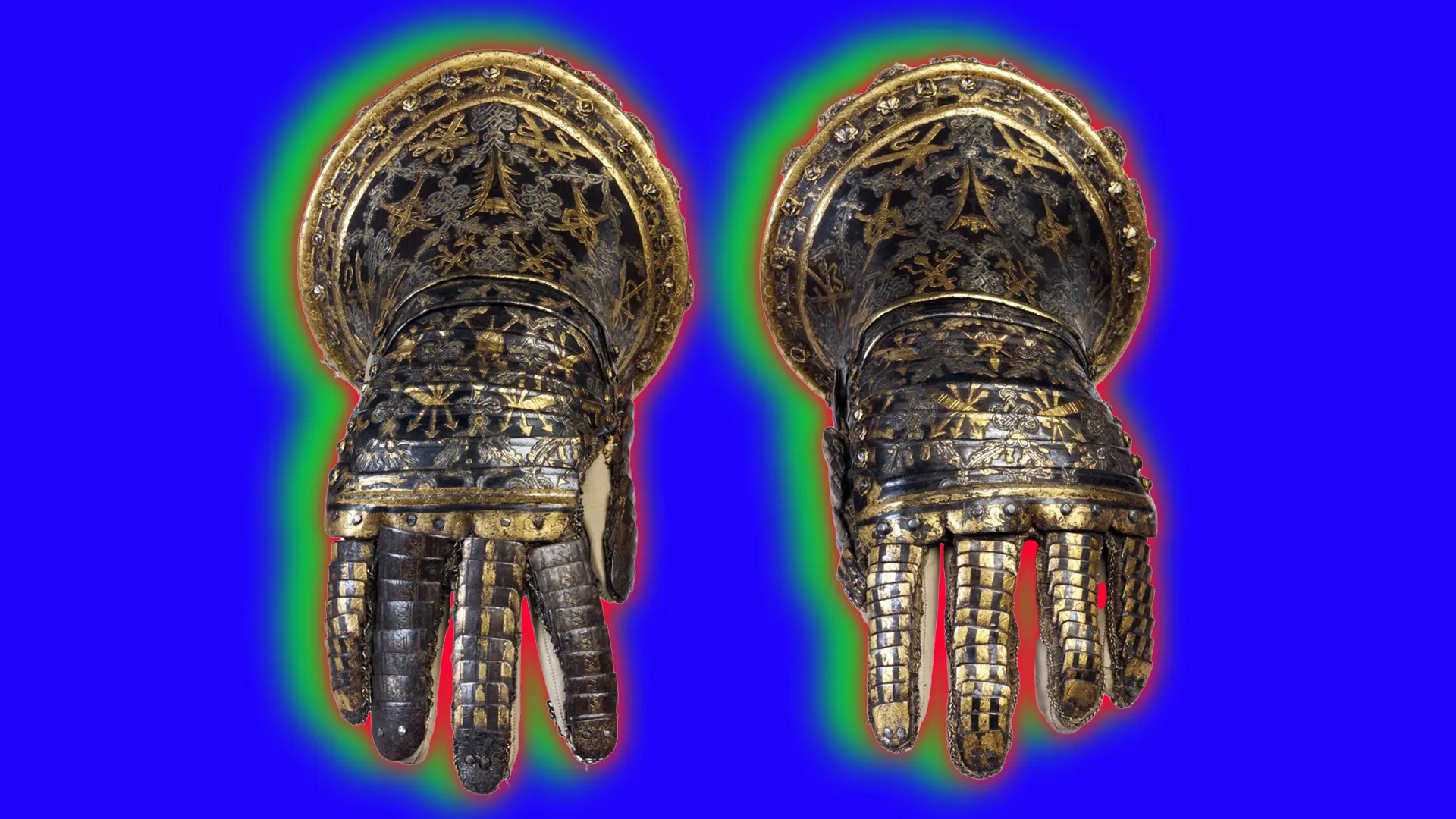 A pair of metal gauntlets in steel damascened set against a blue purple background with green and red halo.