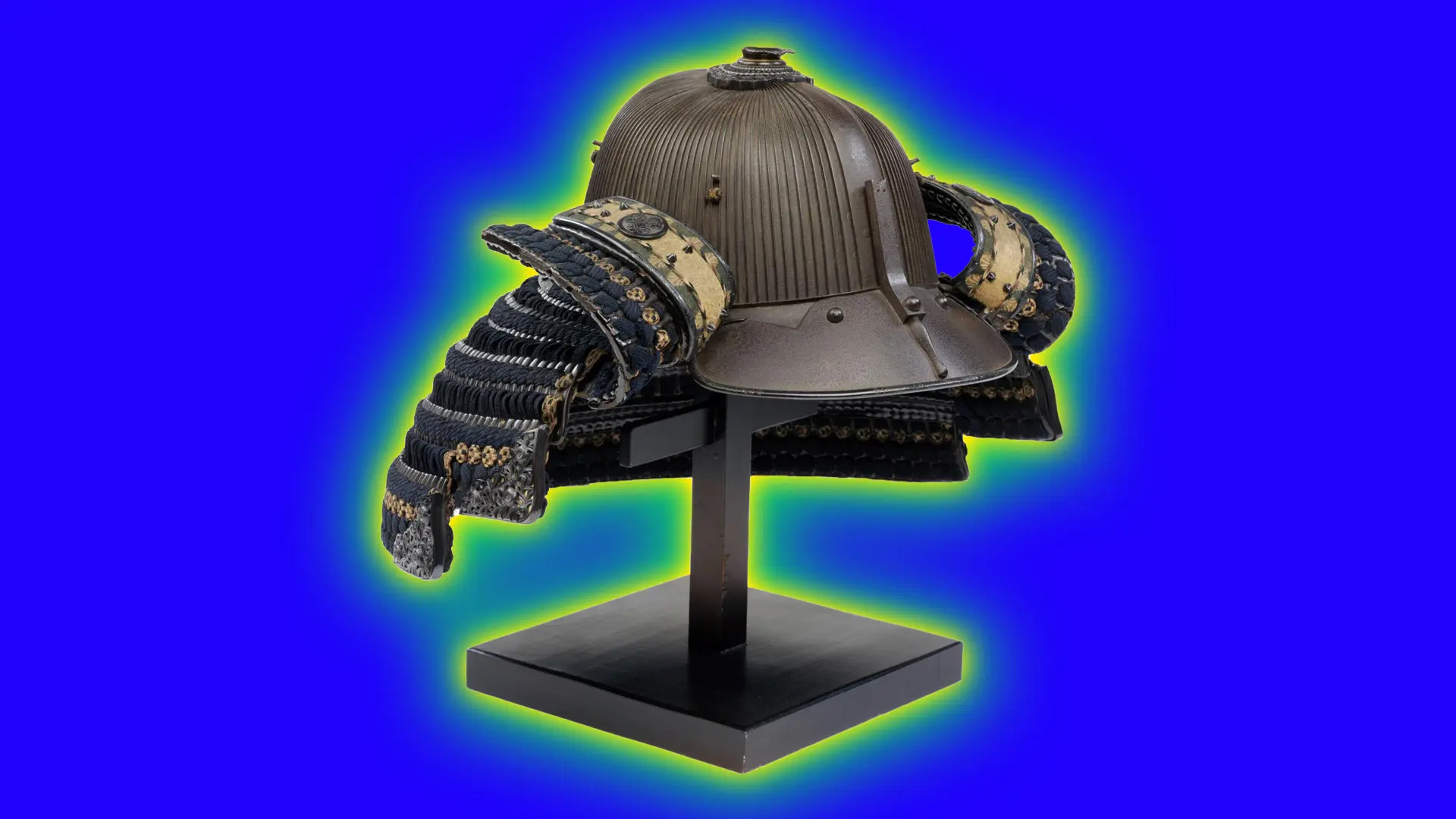 A 16th century Japanese iron helmet with 120 patinated russet iron plates riveted vertically on a stand against a purple blue background with a green and yellow halo.