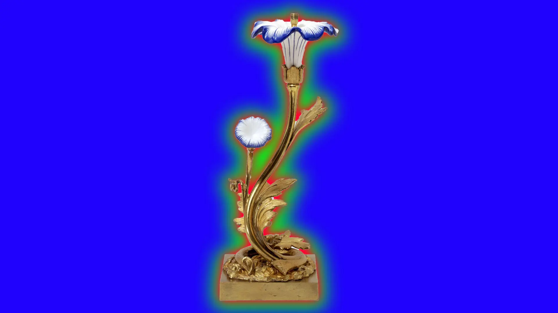 An image of an ornate 19th century lamp in gilded brass with a floral glass shade in white and blue set against a royal blue background with a green halo.