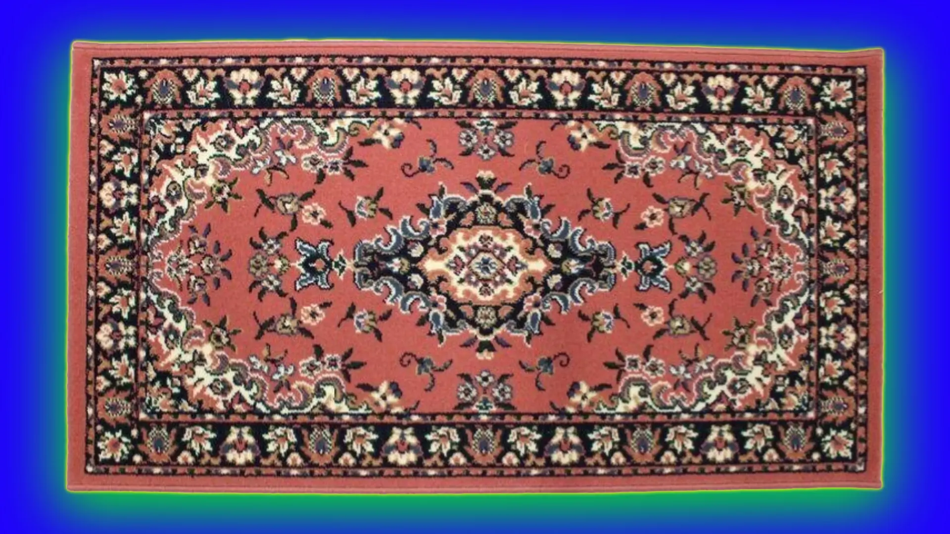 An image of a pink persian-style rug with a central medallion and spandrels set against a royal blue background with a green halo.