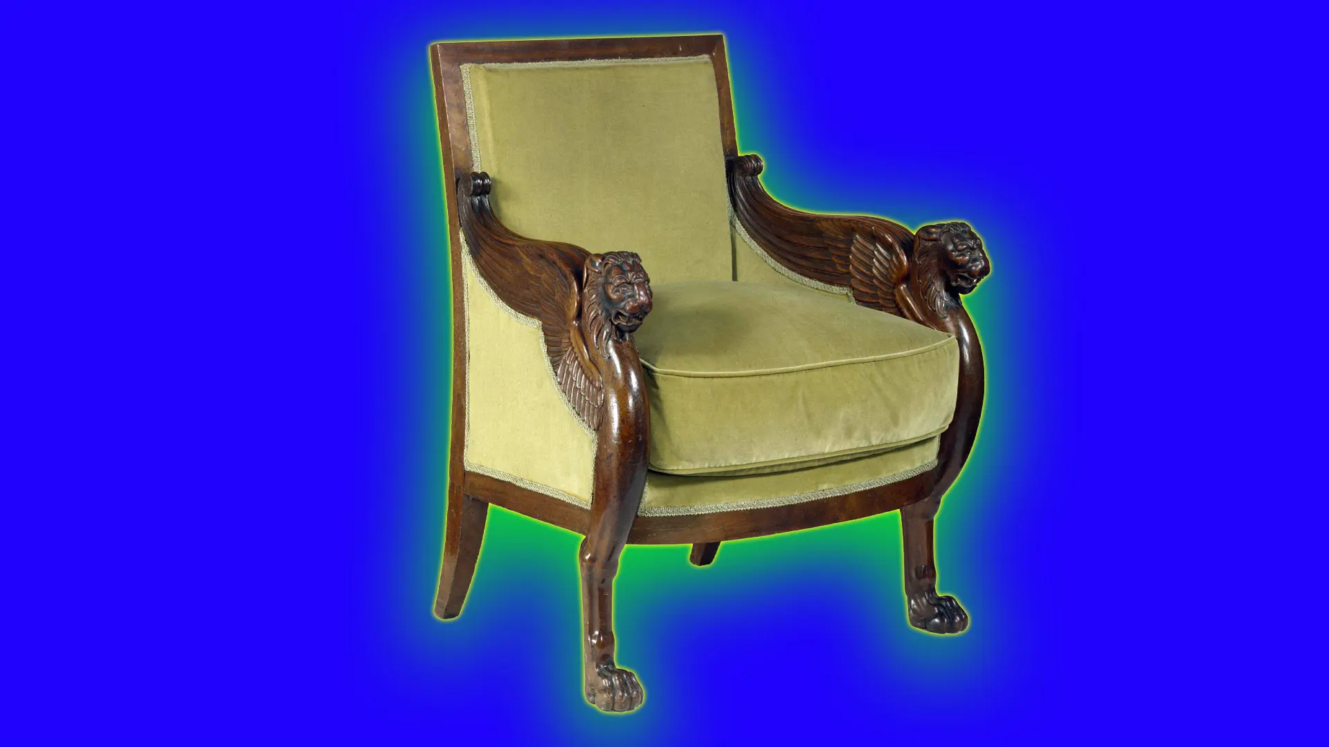 A mahogany chair with gold velvet upholstery and lion motifs on the arms set against a royal blue background with a green halo.