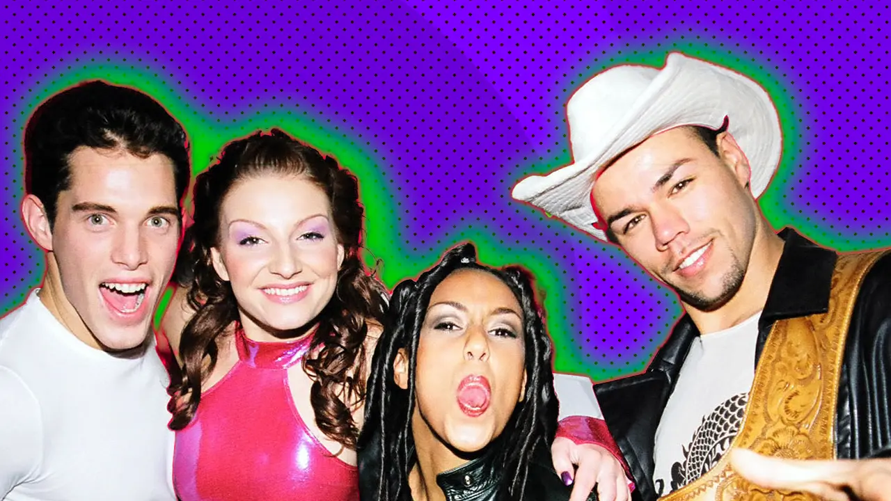 The Vengaboys during 1999 MTV EMA Arrivals at The Point Depot in Dublin, Ireland against a purple background with a green and red halo.