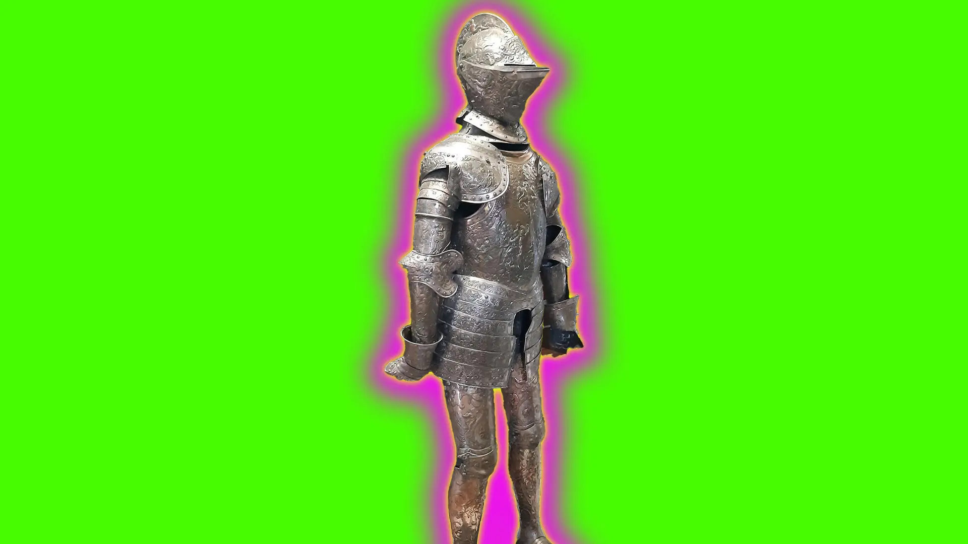 A photo of a suit of armour with helmet stood against a neon green background with a pink and yellow halo.