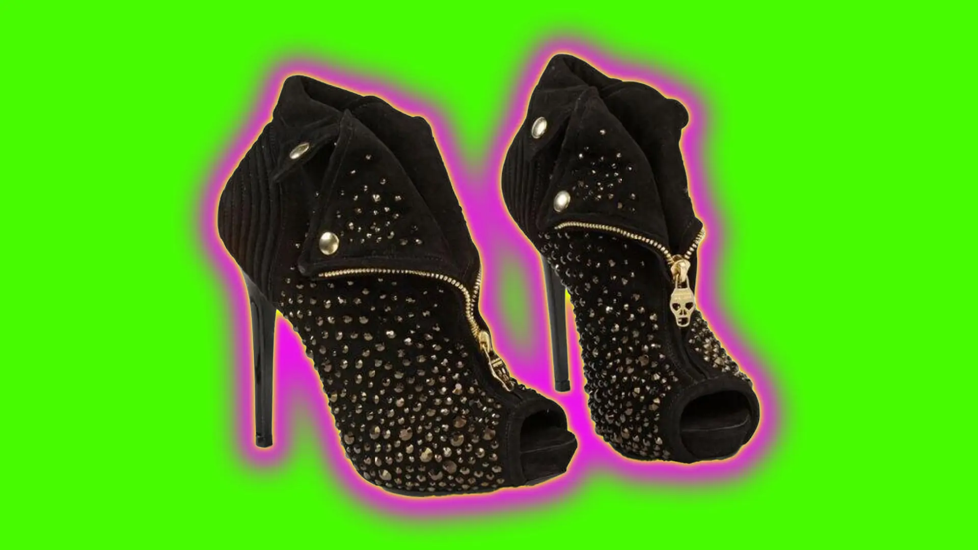 A photo of a pair of black heels with gold studs and zips set against a neon green background with yellow and pink halo.