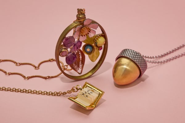 Save on designer jewellery A trio of whimsical pendant necklaces, including lockets featuring messages from William Morris, and mosaic-inspired vintage jewelwork