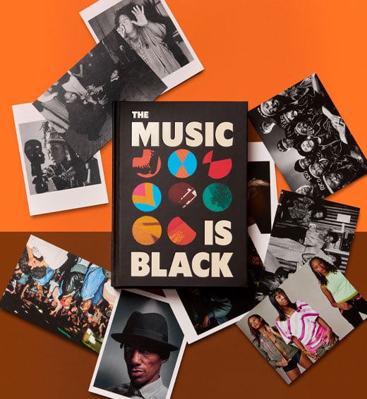 The Music is Black exhibition book and scattered postcards.