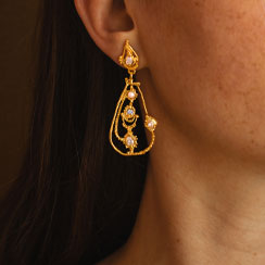 Statement gold drop earrings. 