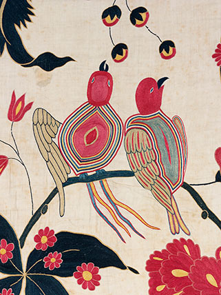 Wall hanging with birds on a branch of flowers