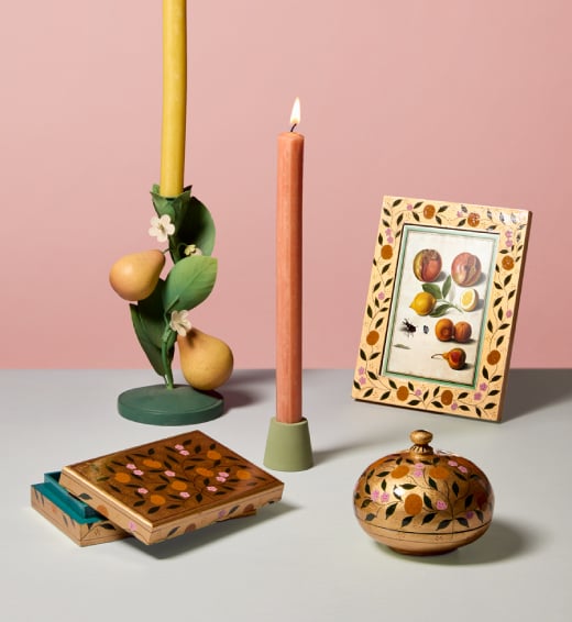 William Morris patterns adorn hand-made matching trinket boxes and photo frame, accented by candlesticks with a floral motif