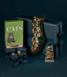 The V&A Christmas shop Arts and Crafts patterned socks, sparkly fashion accessories, fun postcards, and more to gift this Christmas.