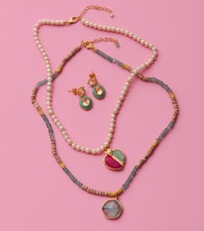 Necklaces and earrings with bright gemstones and enamel, designed by Azga and Carousel jewels